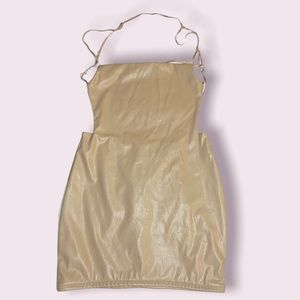 Backless sleevesless faux leather tan mini-dress